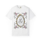 White t-shirt with "Her Last Rodeo" text, cowboy boot, and floral frame.