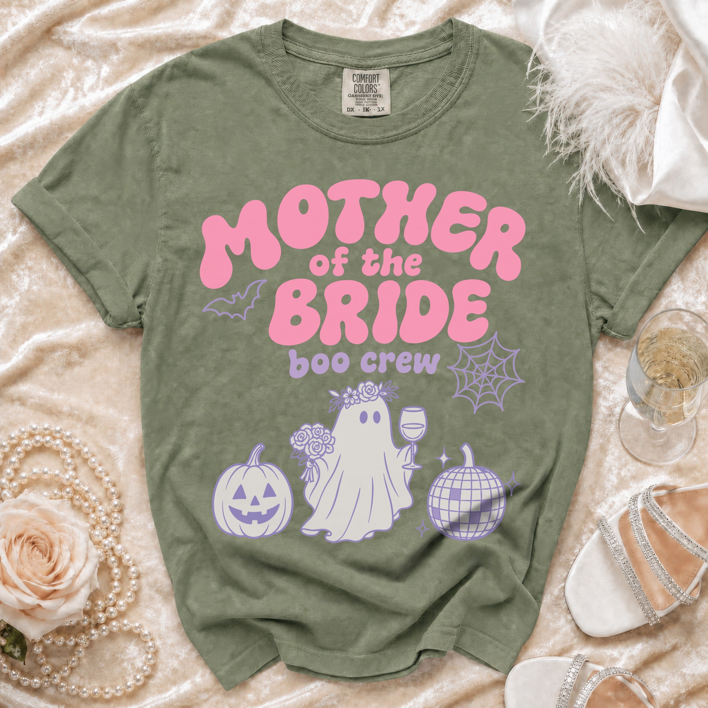 Green t-shirt with "Mother of the Bride Boo Crew" text, ghost, and pumpkins.