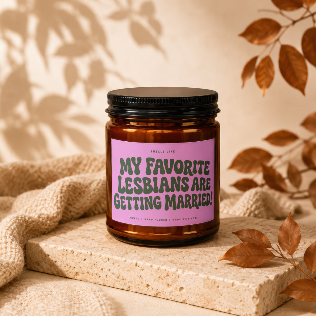 Candle with text "MY FAVORITE LESBIANS ARE GETTING MARRIED!".