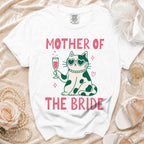 White t-shirt with "MOTHER OF THE BRIDE" text and a cat graphic.