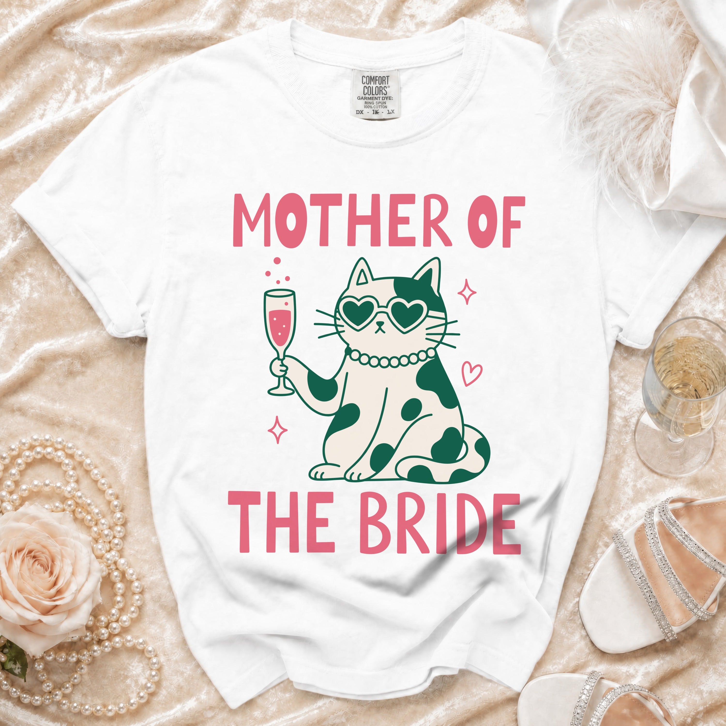 White t-shirt with "MOTHER OF THE BRIDE" text and a cat graphic.