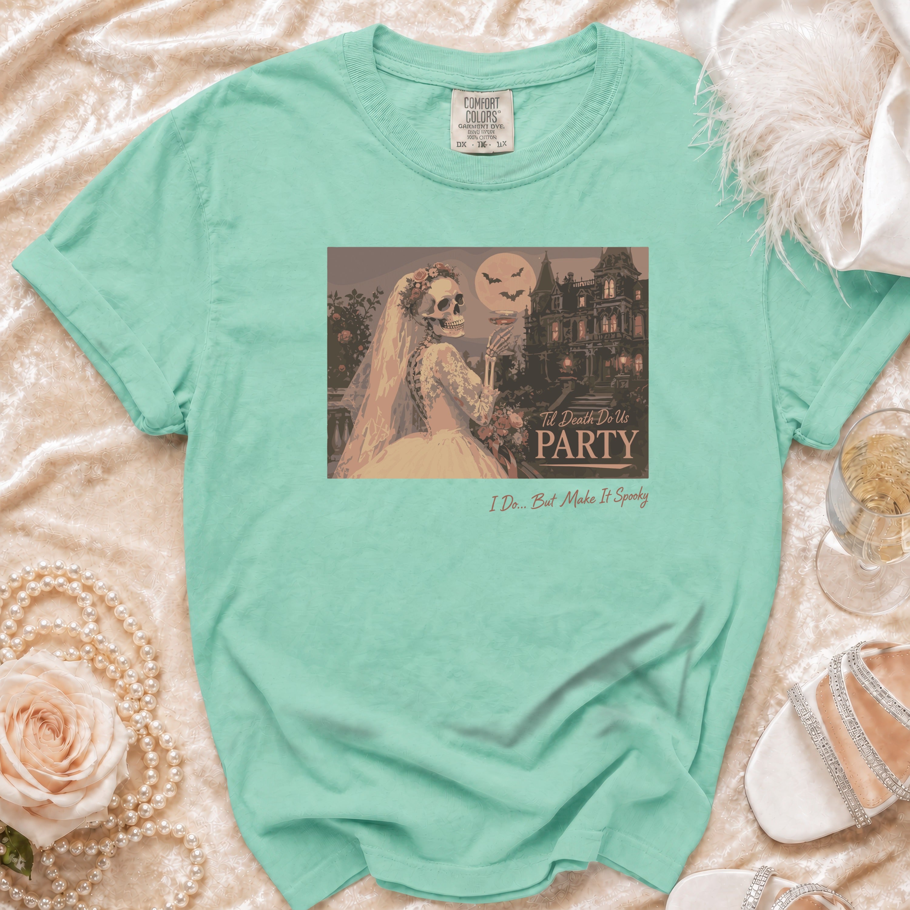 Skeleton bride graphic on a teal Comfort Colors t-shirt, reading "Til Death Do Us Party".