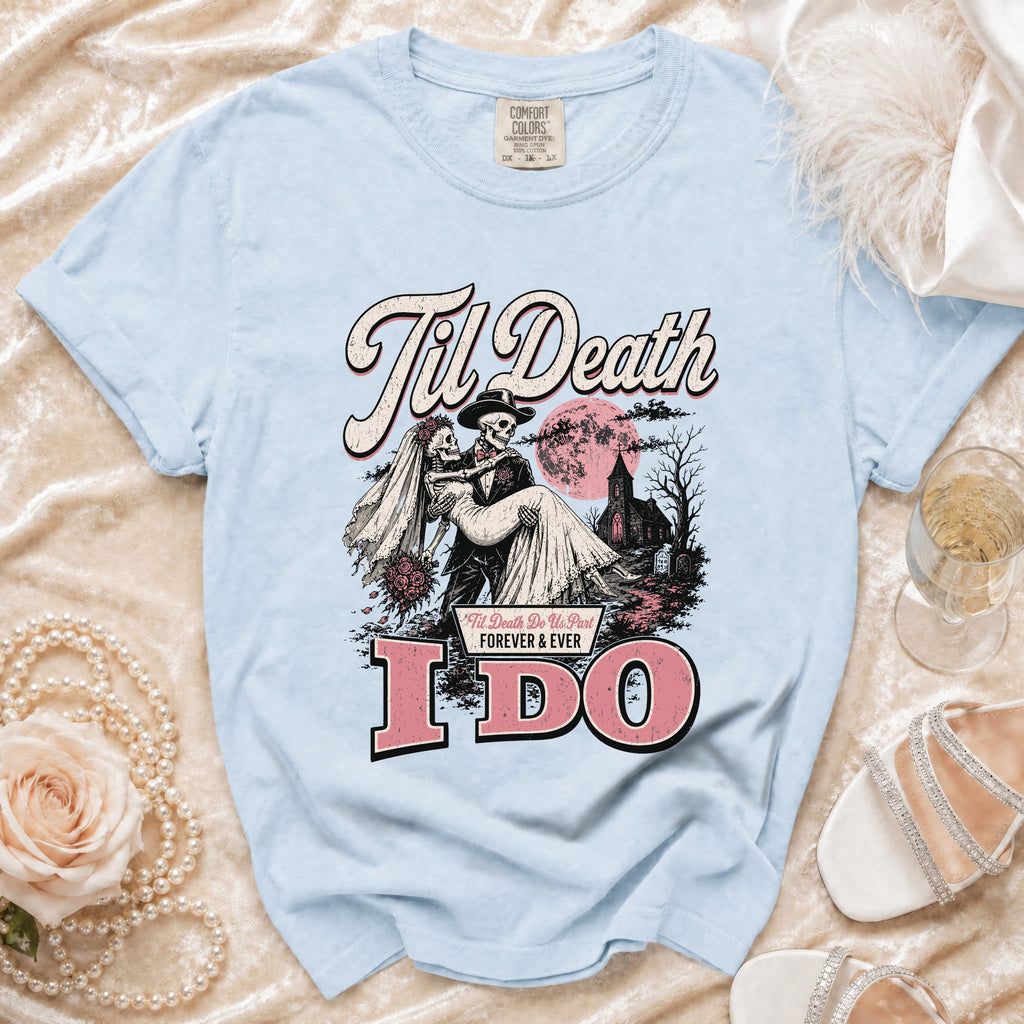 Light blue t-shirt with "Til Death" and skeleton bride and groom graphic saying "I DO".
