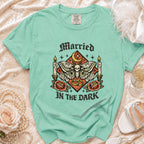 Mint green t-shirt with gothic moth, skull, moon, and text "Married In The Dark".