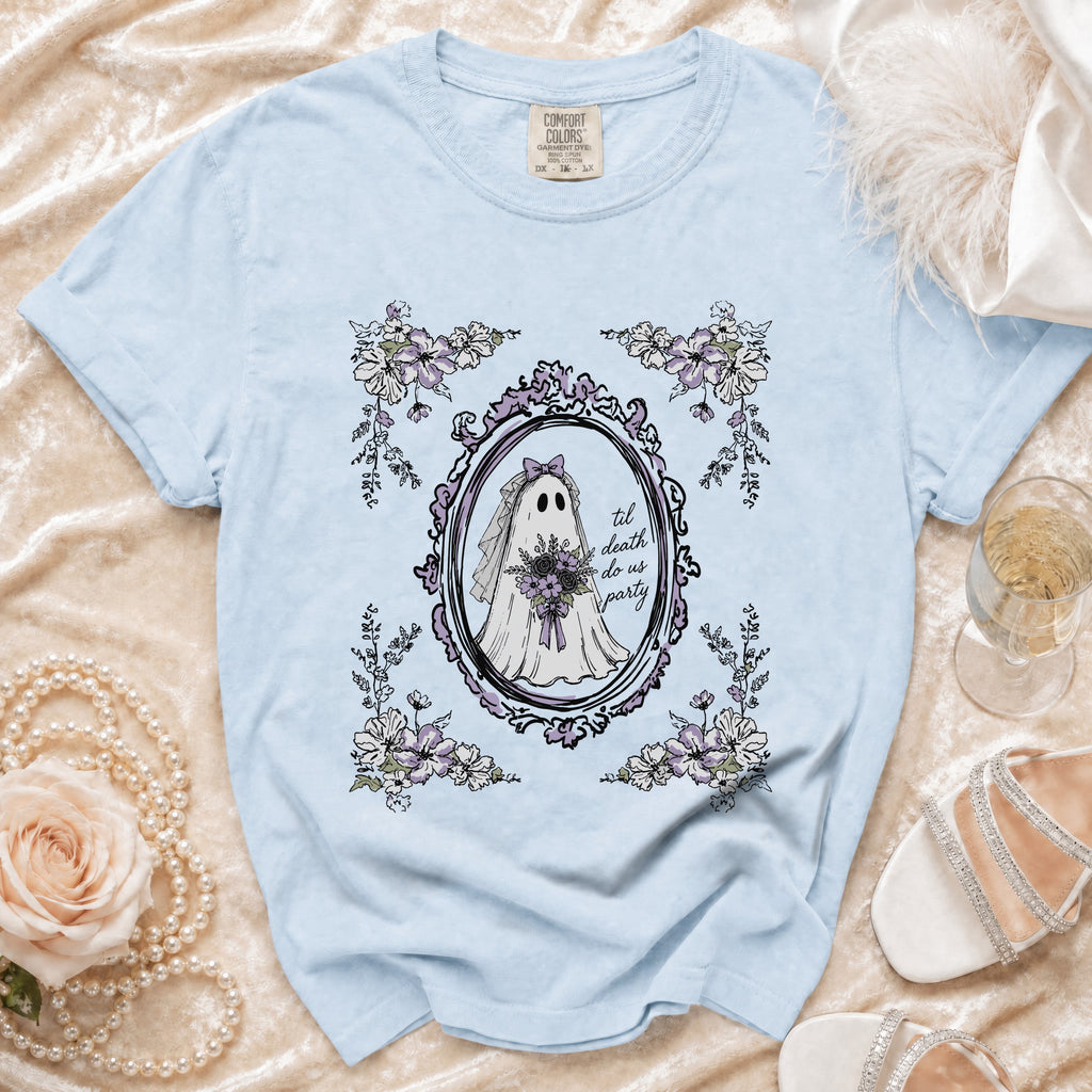 Light blue t-shirt with a ghost bride graphic and floral border, reads "til death do us party".