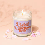 Jar candle with lit wick and pastel pink petals, reads "Love has no exceptions here VOWED".