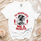 White t-shirt with "Til Death Gets Me A Minute" text and skeleton bride graphic.