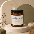 Amber jar candle with "Daughter in Law" definition and quote.