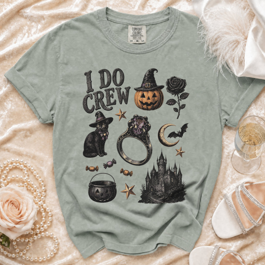 Green t-shirt with "I DO CREW" text and Halloween-themed graphics.
