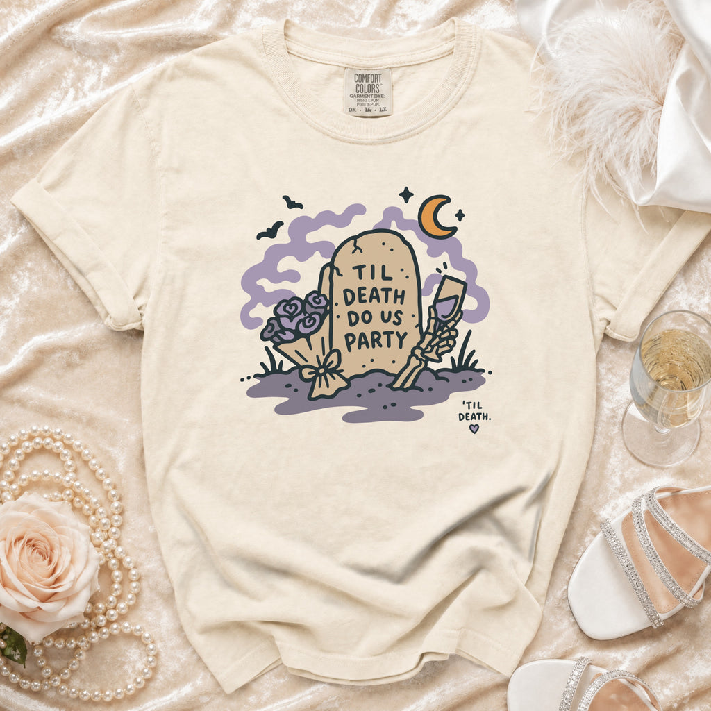 Cream t-shirt with tombstone graphic: "Til Death Do Us Party"