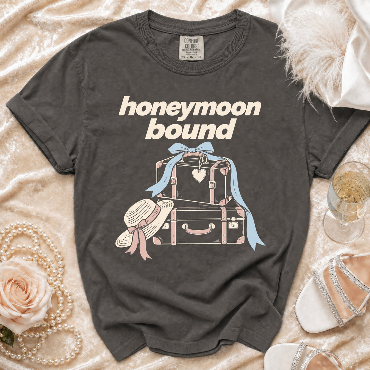 Dark gray t-shirt with "honeymoon bound" text and luggage graphic.
