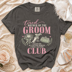 T-shirt with "tired MOTHER OF THE GROOM" and "CLUB" text, 12 words.