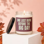 Glass candle with lid off reads "ONE LAST BURN BEFORE THE BIG DAY".