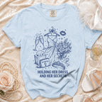 Light blue t-shirt with dark blue sketch of wedding items and text.