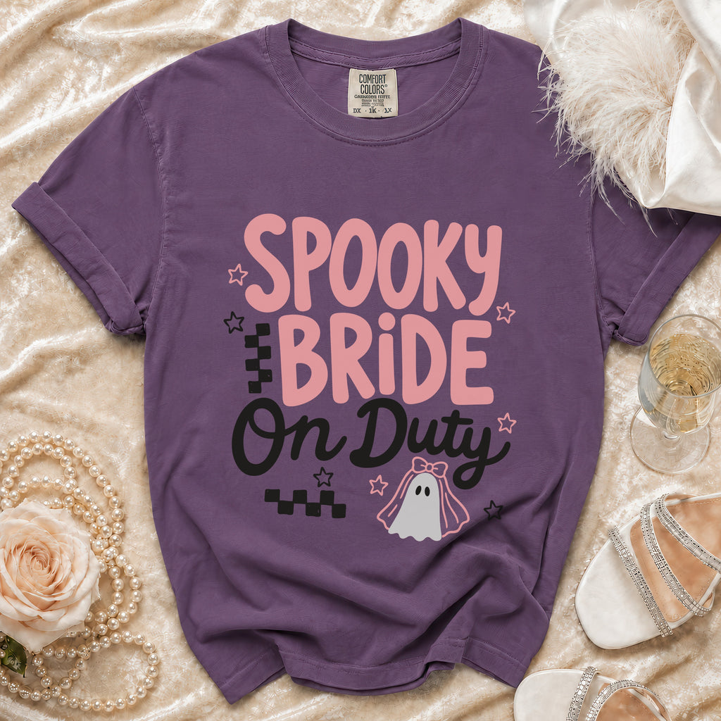 Purple t-shirt with "Spooky Bride On Duty" text and a ghost bride graphic.