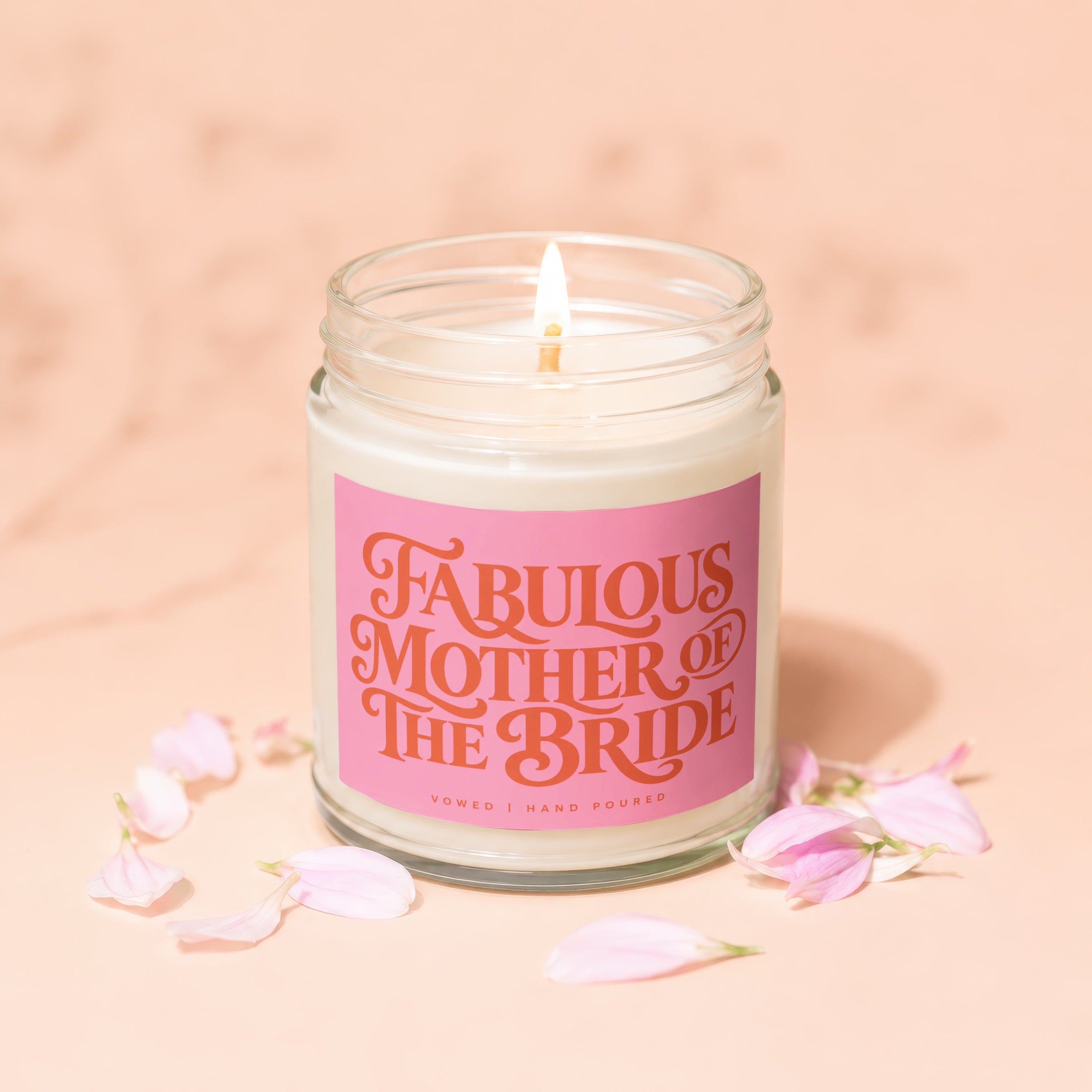 Candle with pink label reading "Fabulous Mother of the Bride."