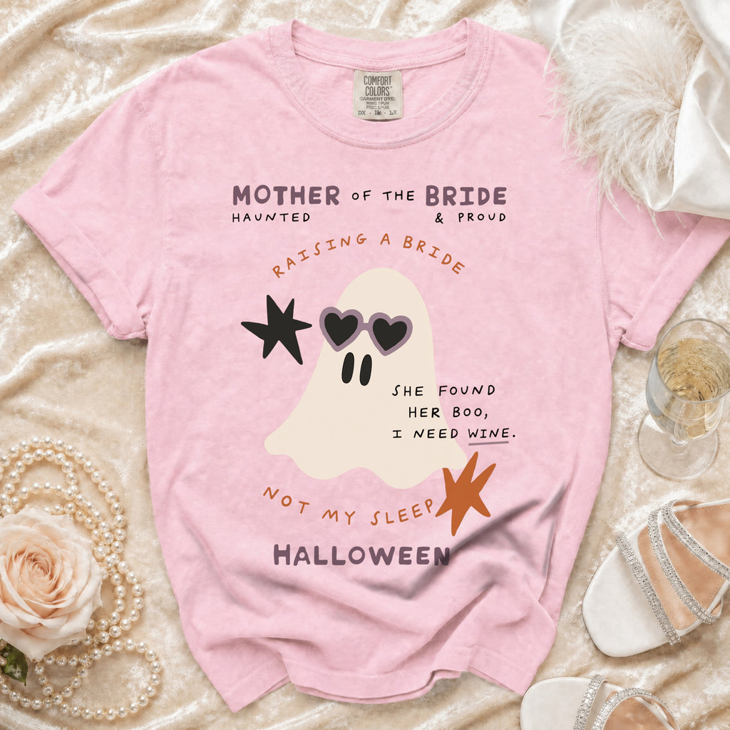 Pink t-shirt with ghost graphic saying "Mother of the Bride" and "Raising a Bride" for Halloween.