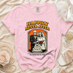 Pink t-shirt with "Happily Never After" and skeleton bride and groom cutting cake.