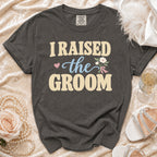 Charcoal t-shirt with "I RAISED the GROOM" text, heart, and flowers.