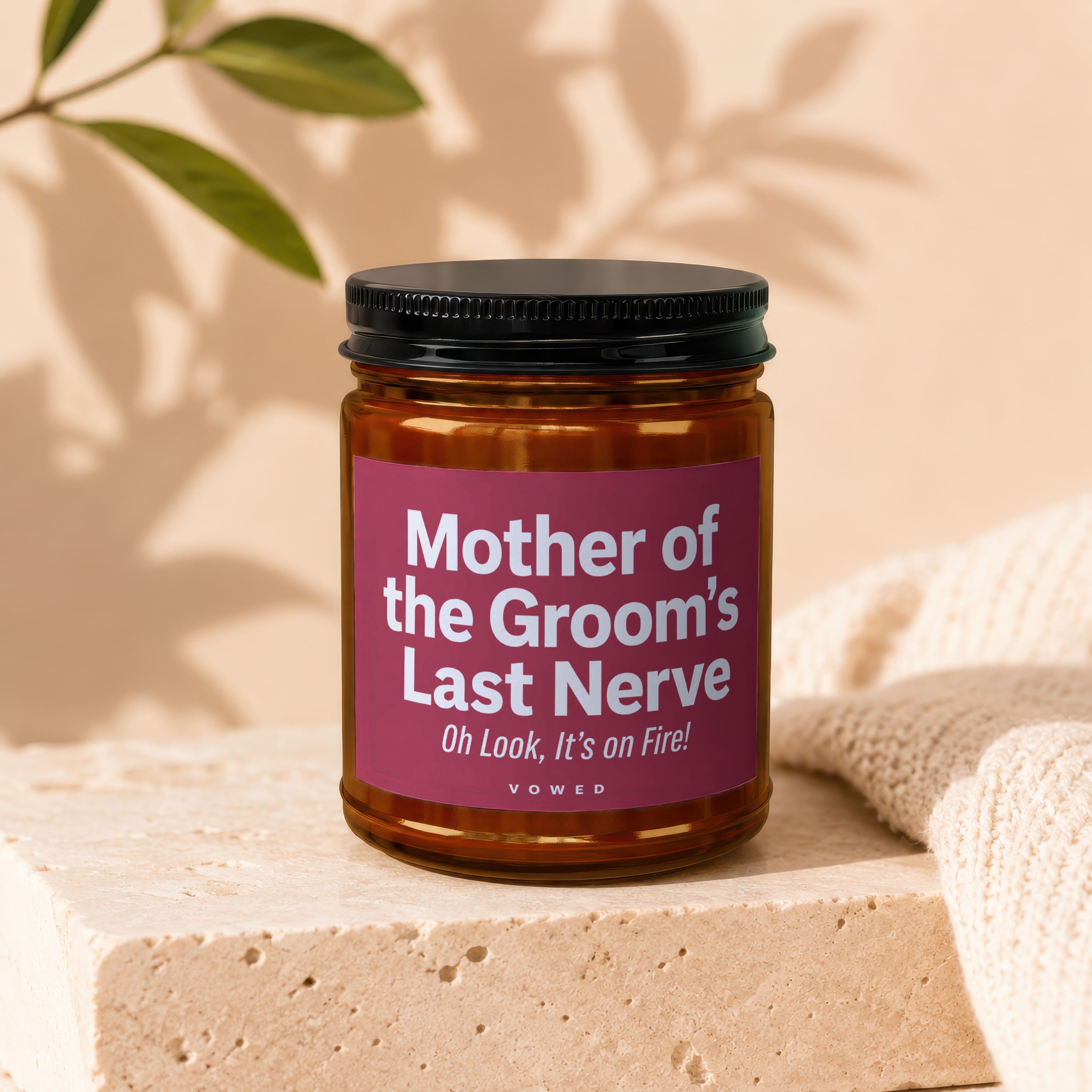Brown glass candle with "Mother of the Groom's Last Nerve" text.