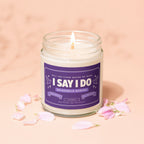Candle with "I Say I Do Bridesmaid Wanted" label, hand poured soy wax blend.