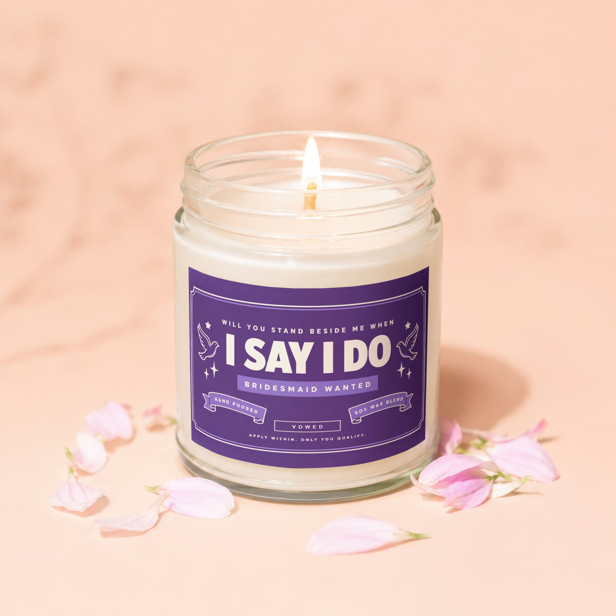 Candle with "I Say I Do Bridesmaid Wanted" label, hand poured soy wax blend.