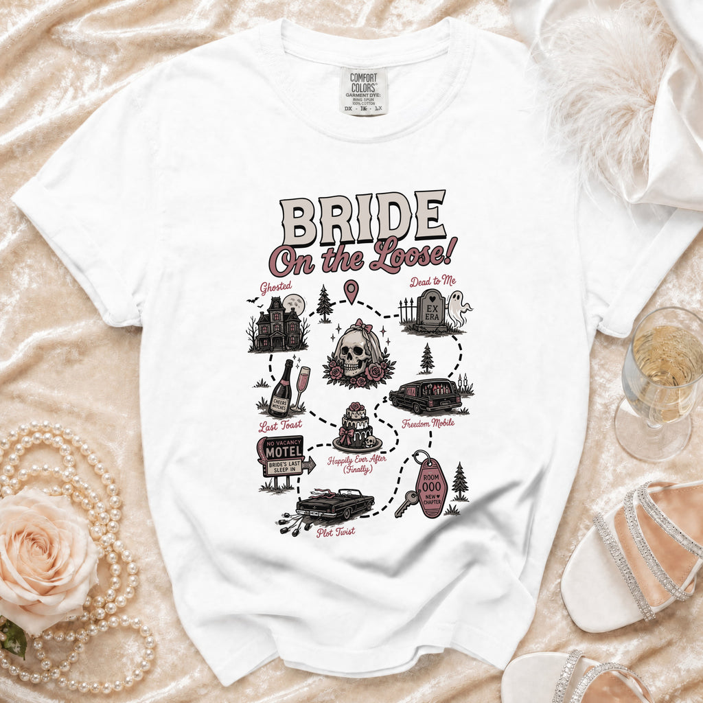 White t-shirt with "Bride On the Loose!" graphic illustrating a wedding journey.