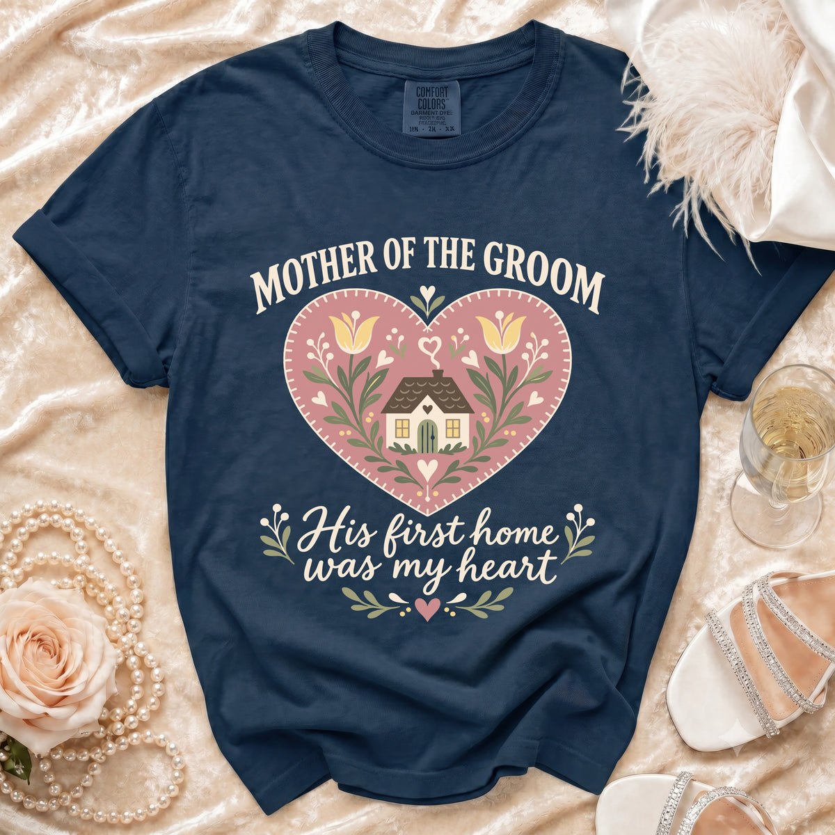 Navy t-shirt with "Mother of the Groom" and heart house graphic.