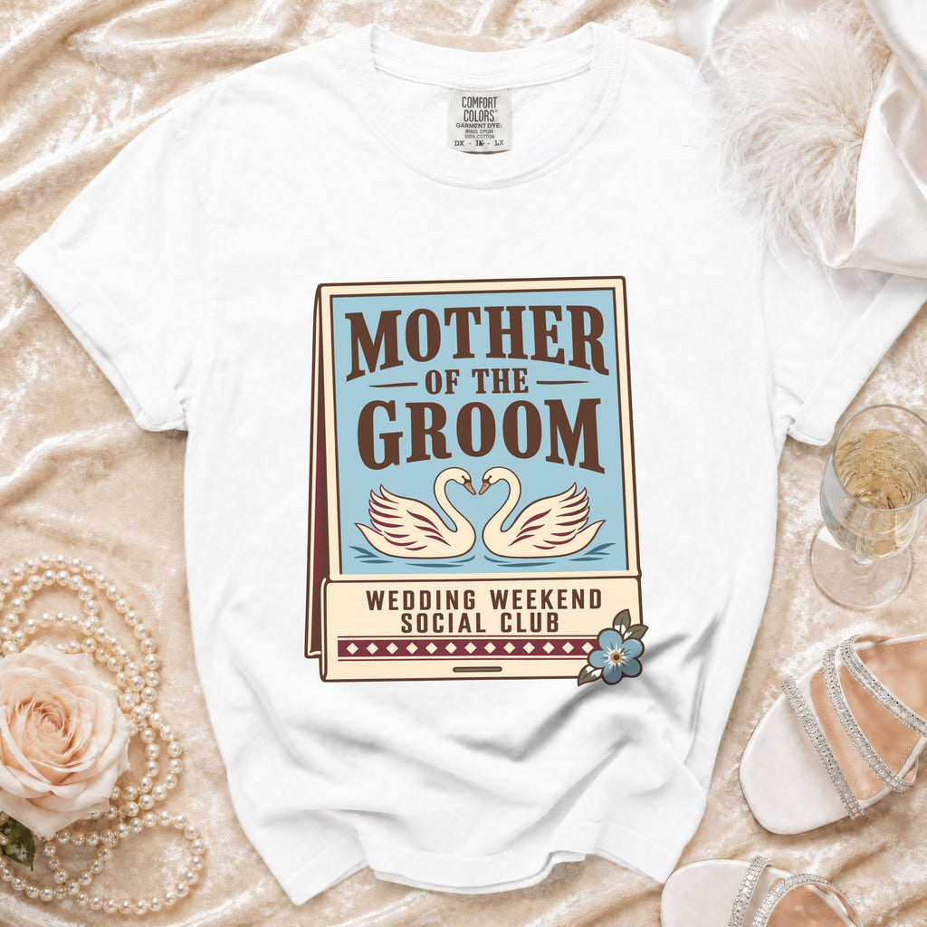 White t-shirt with "Mother of the Groom Wedding Weekend Social Club" text and swans.