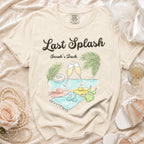 "Last Splash Sarah's Bach" graphic on a cream t-shirt with beach elements.