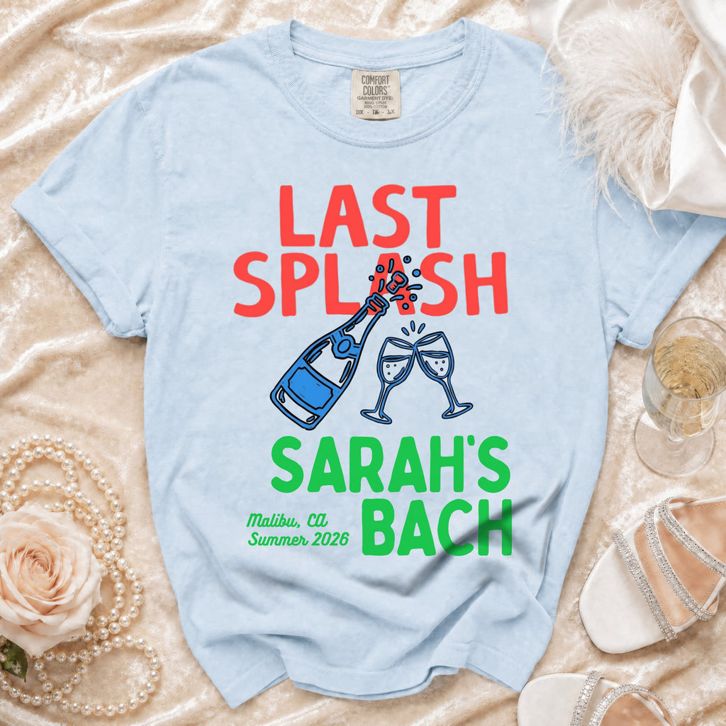 Light blue t-shirt with "LAST SPLASH SARAH'S BACH" and champagne graphic.