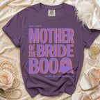 Purple t-shirt featuring the text Mother of the Bride Boo with a ghost graphic.