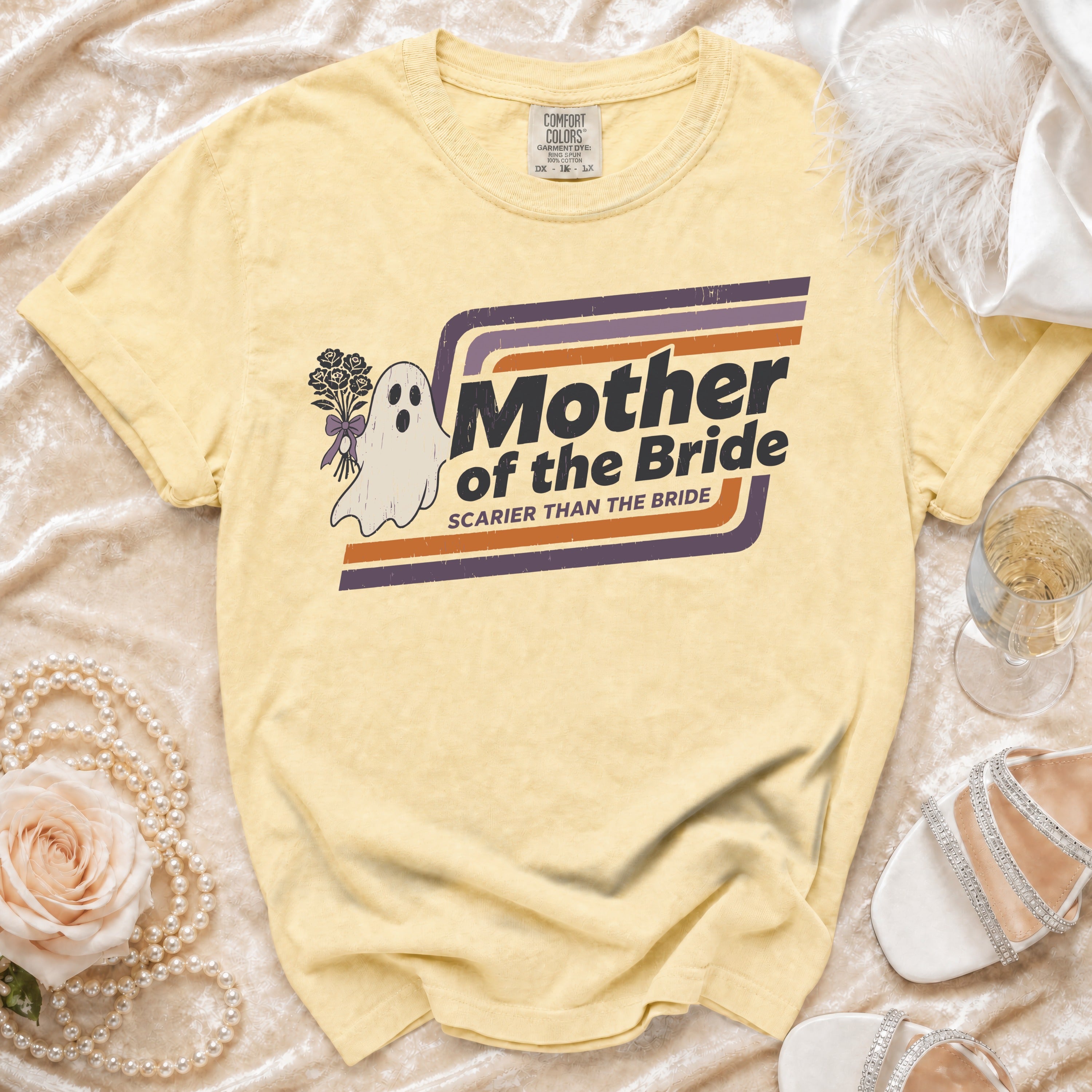 Yellow t-shirt with ghost, flowers, and "Mother of the Bride Scarier Than the Bride" text.
