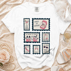 White t-shirt with postage stamp graphics about wedding roles and titles.