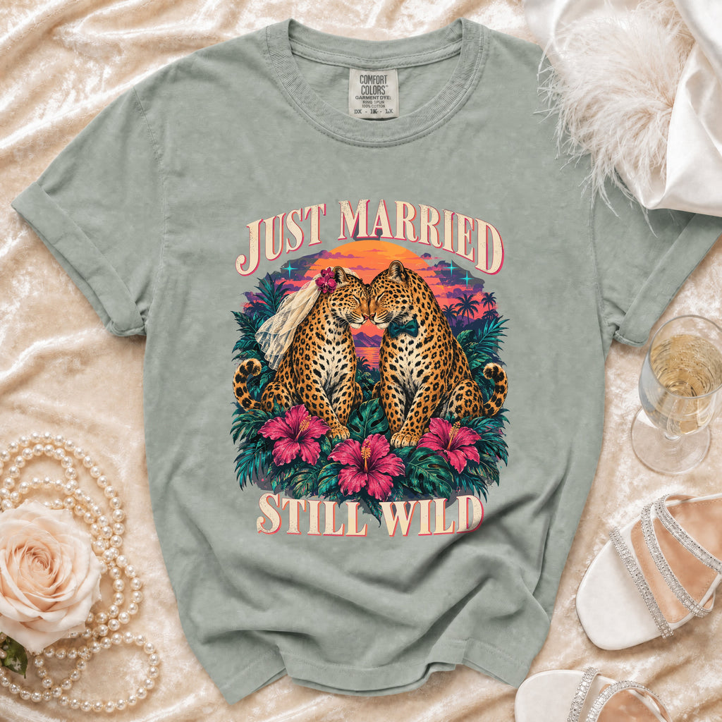 Light green t-shirt with "Just Married Still Wild" graphic of leopards at sunset.