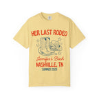 Yellow t-shirt with "Her Last Rodeo Nashville TN Summer 2026" and cowboy boots.