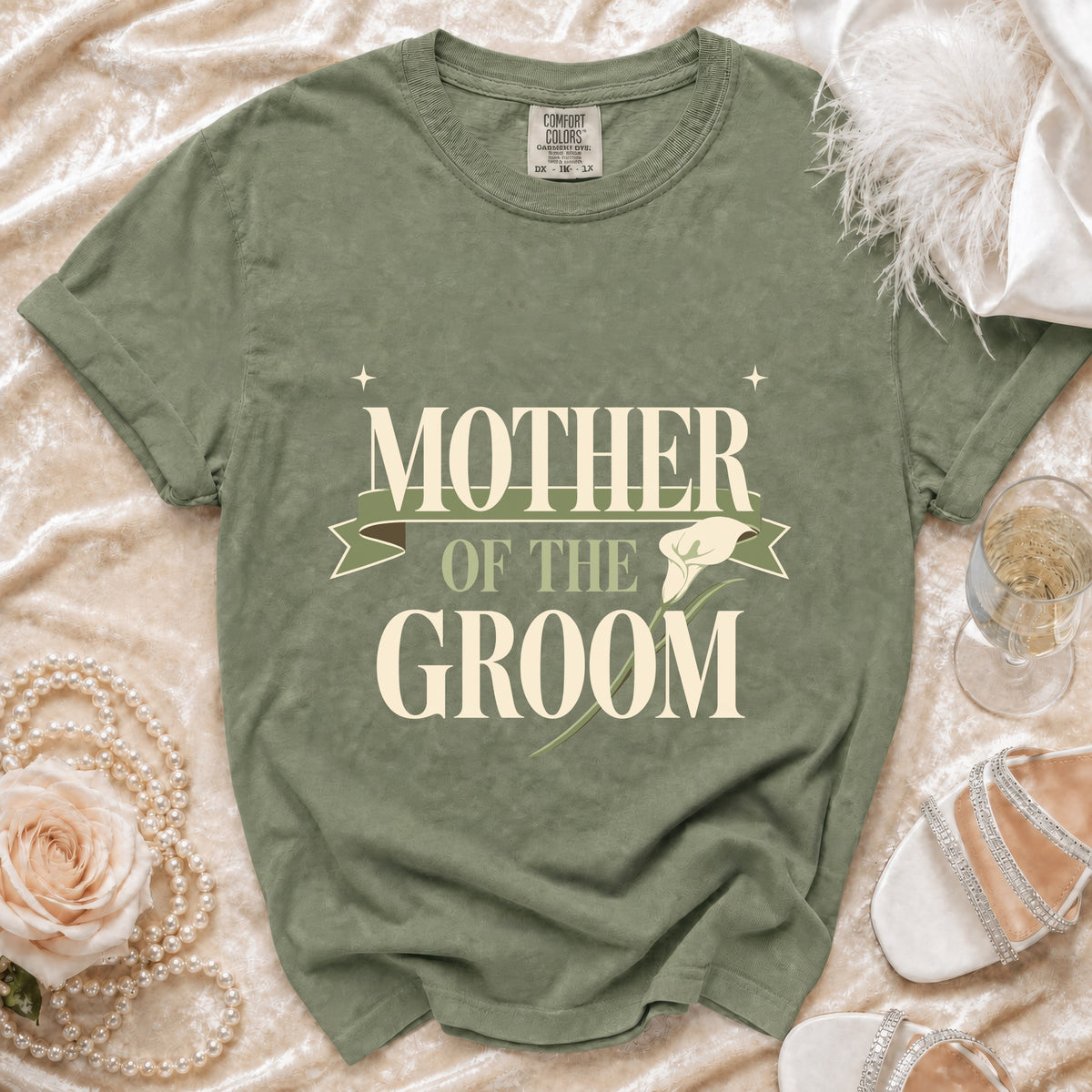 Green t-shirt with "Mother of the Groom" text and floral design.