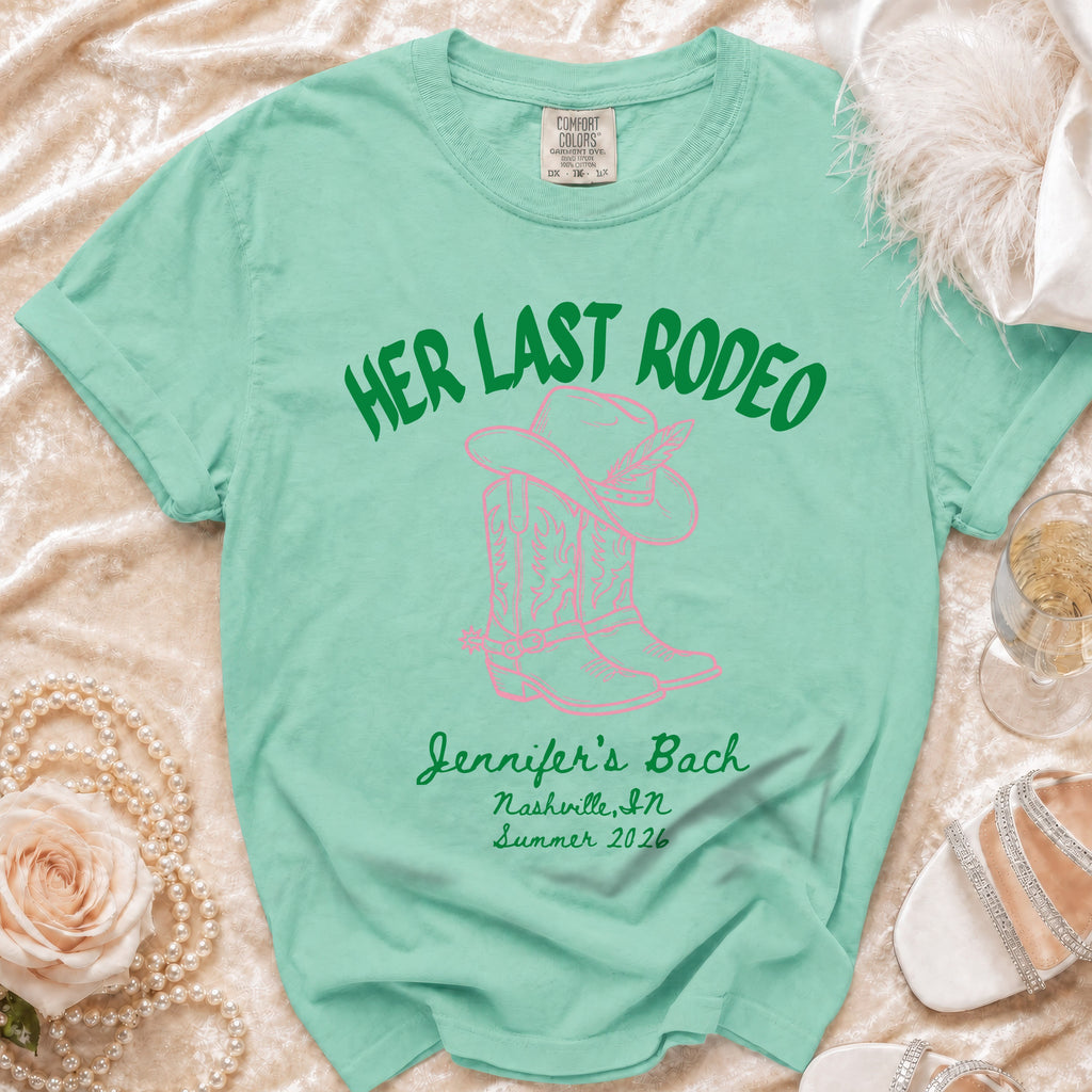 Mint green t-shirt with "Her Last Rodeo" text and cowboy boots.