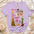 Lilac t-shirt with "Mother of the Bride" graphics including a ghost, leopard, and lily.
