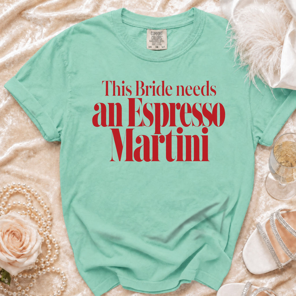 Teal t-shirt with red text reading "This Bride needs an Espresso Martini"