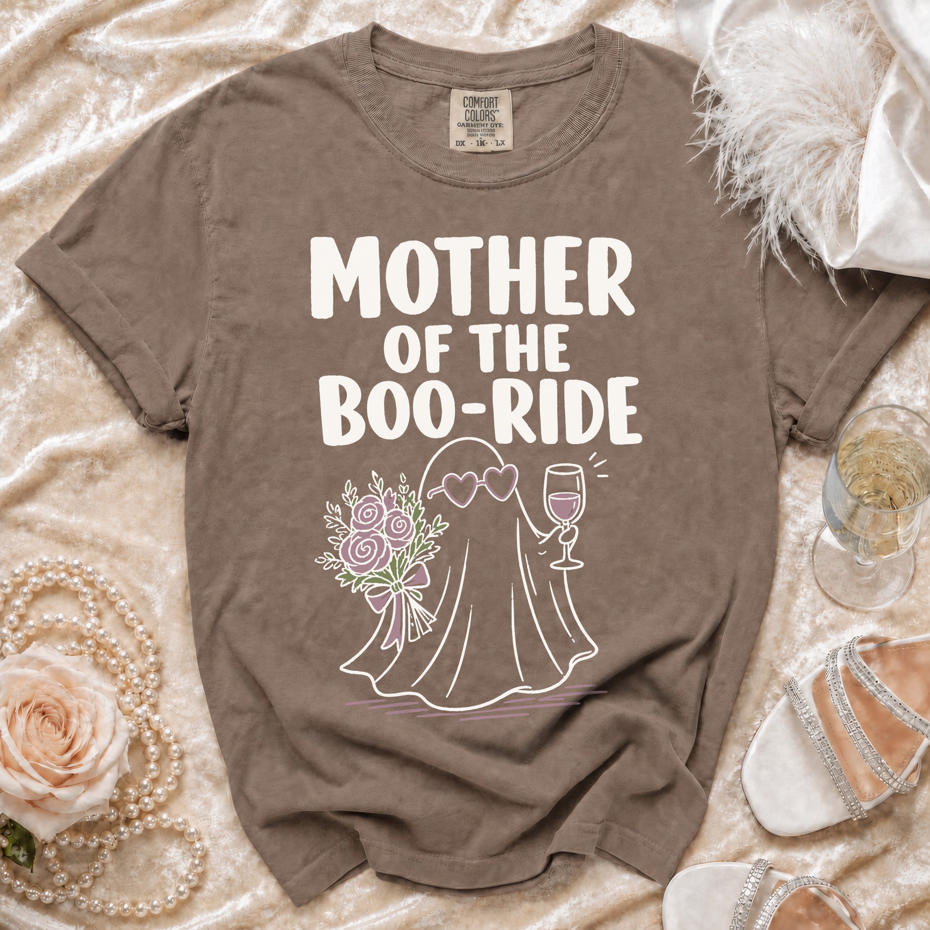 Brown t-shirt with "MOTHER OF THE BOO-RIDE" and ghost graphic.