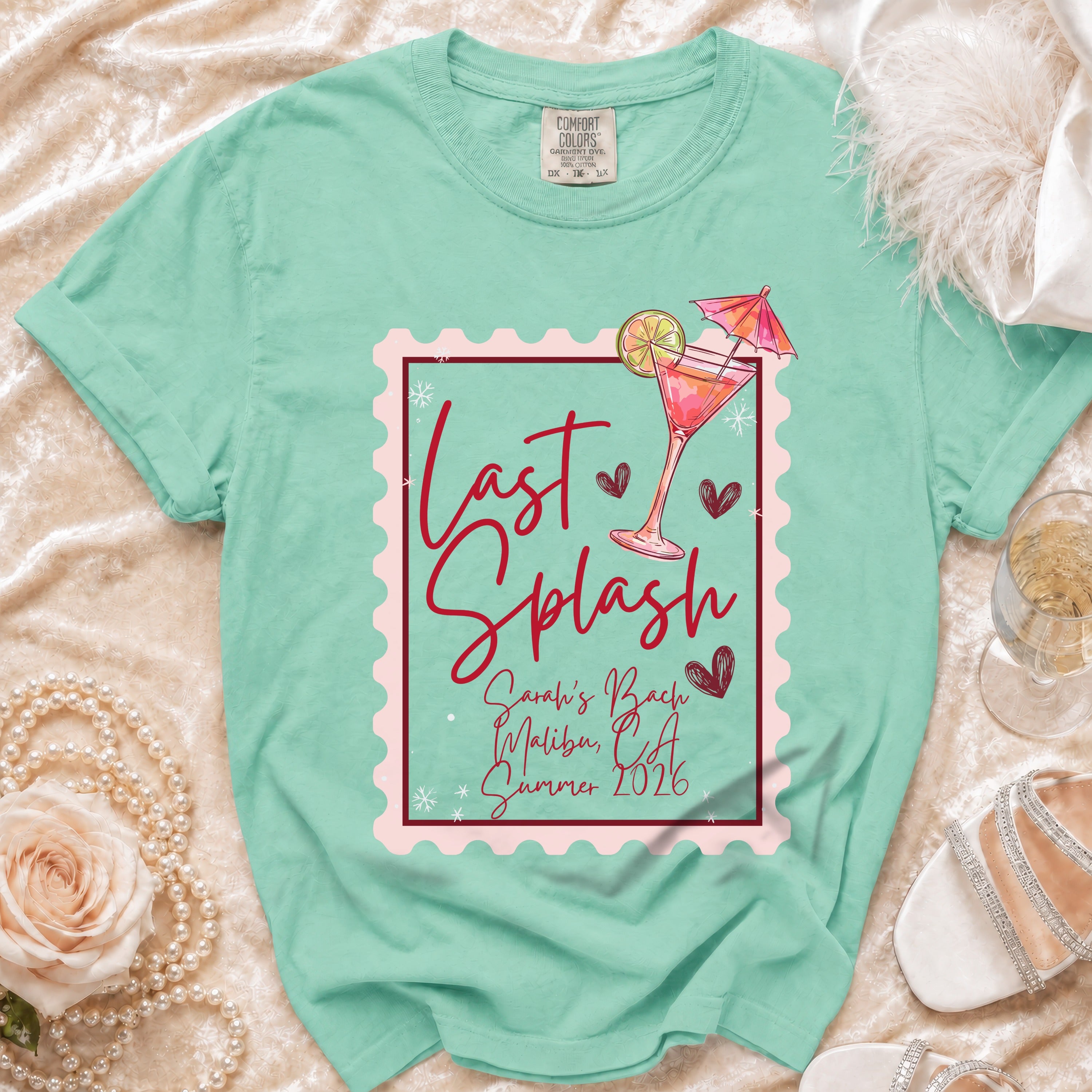 Mint green t-shirt with "Last Splash" text and heart graphics.