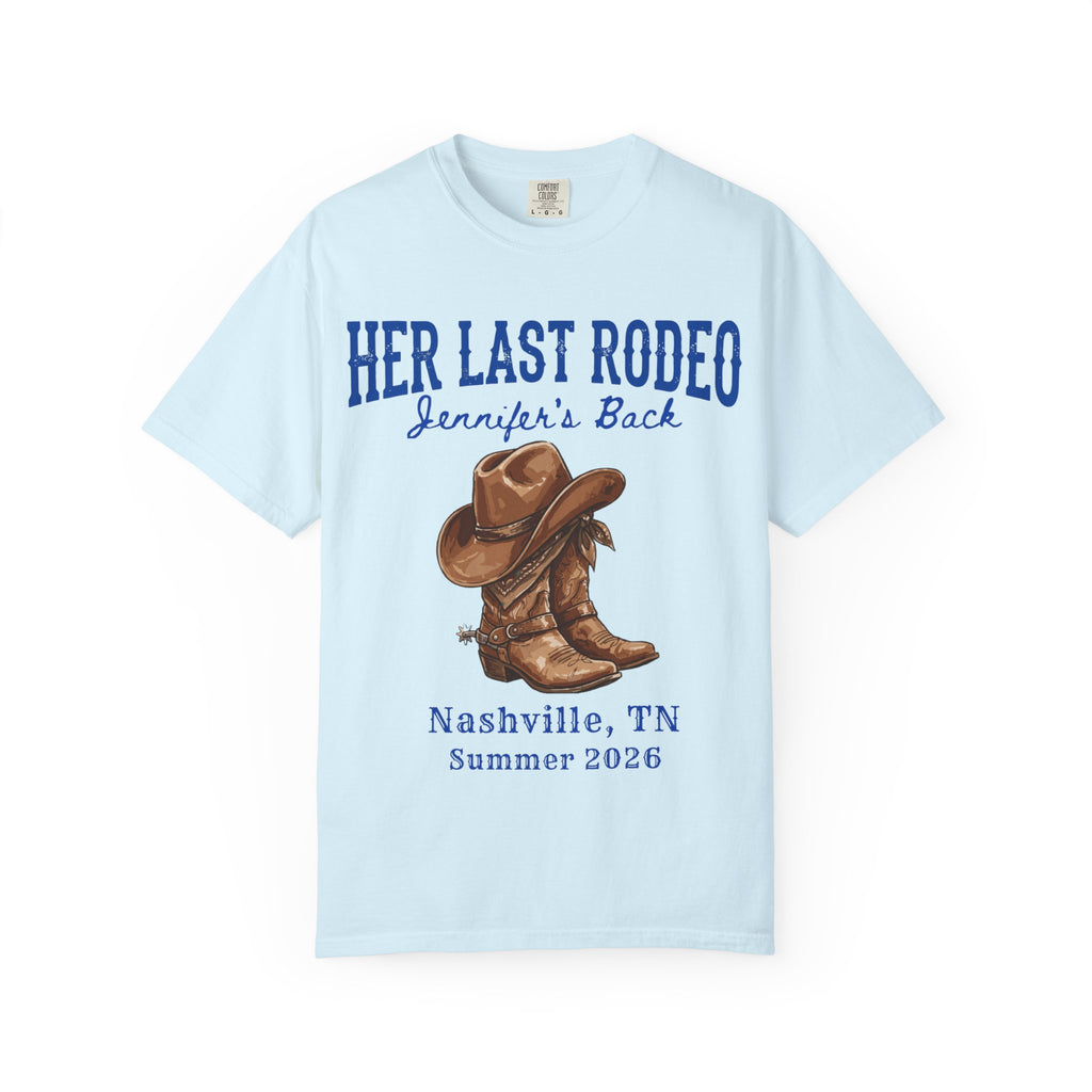 Light blue t-shirt with "Her Last Rodeo" and cowboy boots graphic.