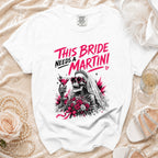 White t-shirt with "This Bride Needs a Martini" text and skeleton graphic.