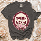 Grey t-shirt with "Mother of the Groom" text and floral design.