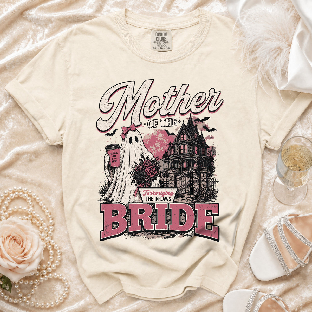 Cream t-shirt with ghost, haunted house, and text "Mother of the Bride Terrorizing the In-Laws".