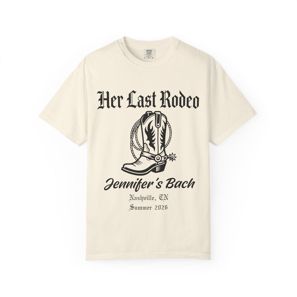 Cream t-shirt with "Her Last Rodeo" and cowboy boot graphic.