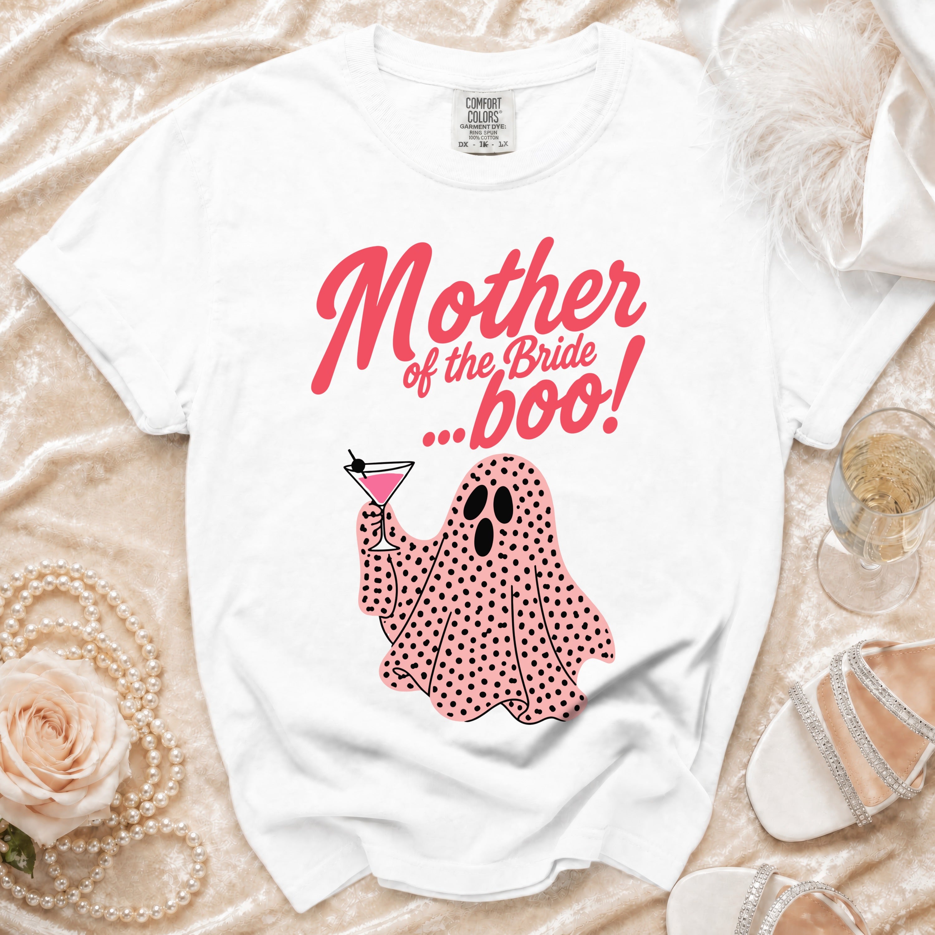 White t-shirt with "Mother of the Bride...boo!" text and a pink ghost with a cocktail.