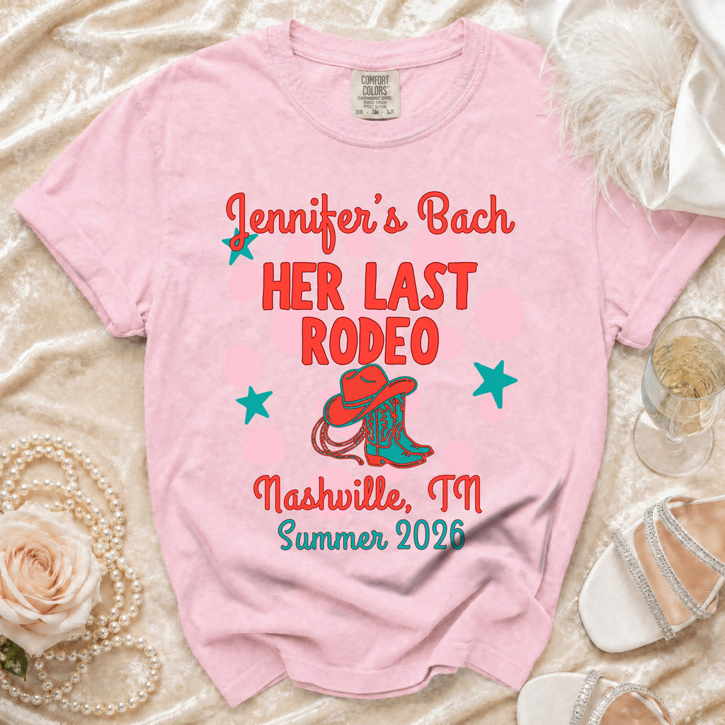 Pink t-shirt with "Jennifer's Bach Her Last Rodeo Nashville, TN Summer 2026" text.
