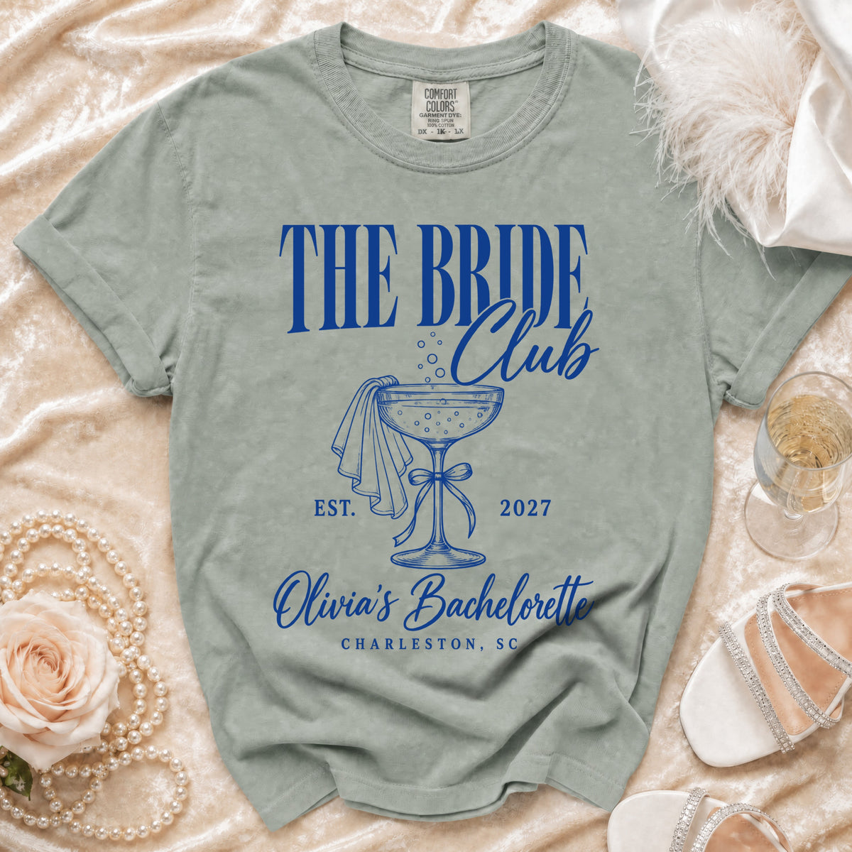T-shirt with "The Bride Club" and "Olivia's Bachelorette Charleston, SC" text.